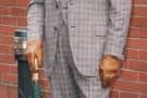 Gentleman With Unbottoned Waistcoat Button