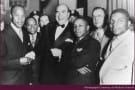 Nucky Johnson In Double Breasted Tuxedo with Boutonniere in Buttonhole