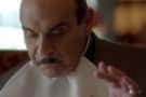 Poirot Eating with Napkin
