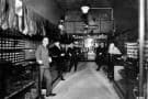 Harry S. Truman & in his haberdashery ca. 1921