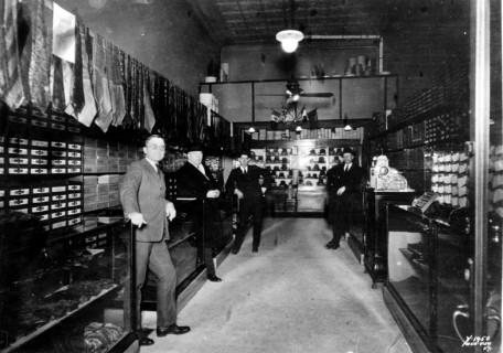 Harry S. Truman & in his haberdashery ca. 1921