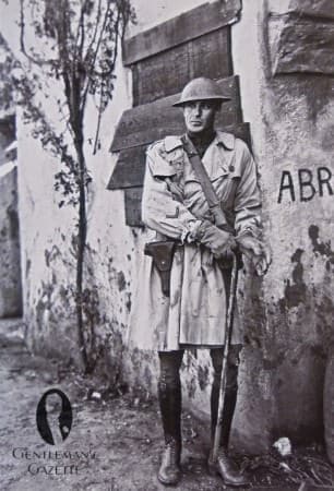 Soldier in Over Knee Length Trench Coat