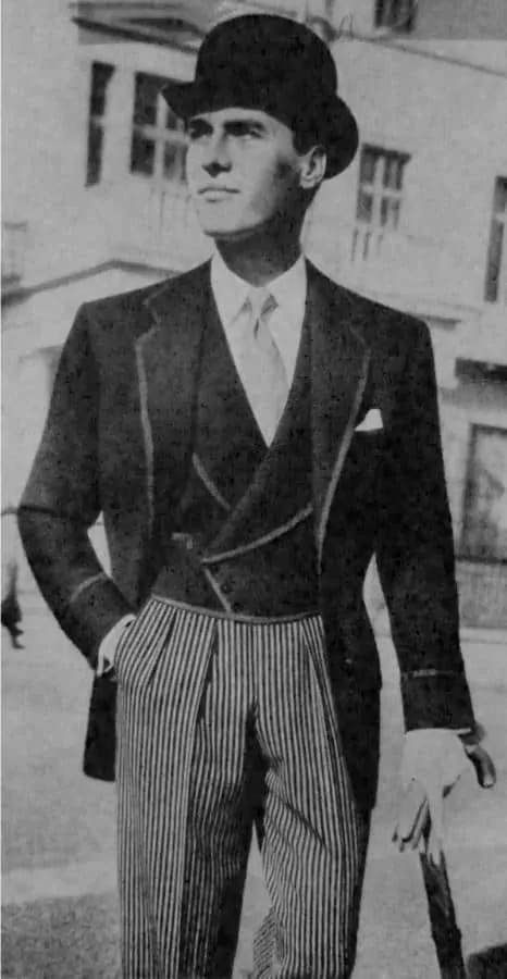 Stresemann or stroller suit with piping and black bowler hat and double breasted piped vest1950