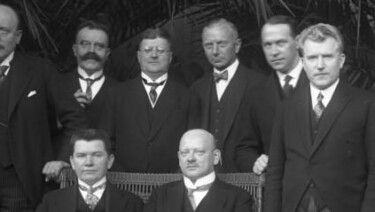 Photograph of 9 men in typical Stresemann ensembles