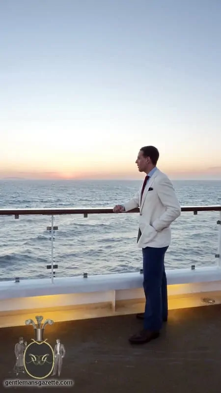 Raphael Schneider wearing his at sea ensemble on the deck of a cruise ship 1