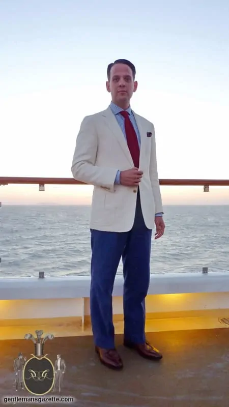 Raphael Schneider wearing his at sea ensemble on the deck of a cruise ship 2