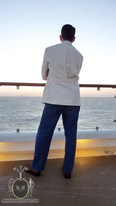 Raphael Schneider wearing his at sea ensemble on the deck of a cruise ship 3