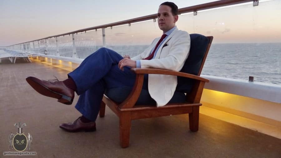 Raphael Schneider wearing his at sea ensemble on the deck of a cruise ship 4