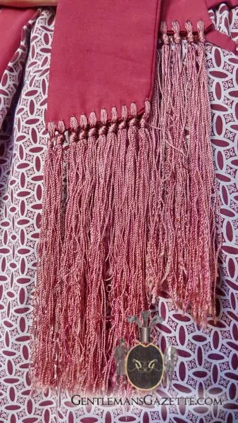 A photograph of the fringe of a silk dressing gown