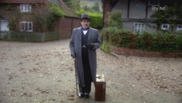 Poirot in Long Overcoat