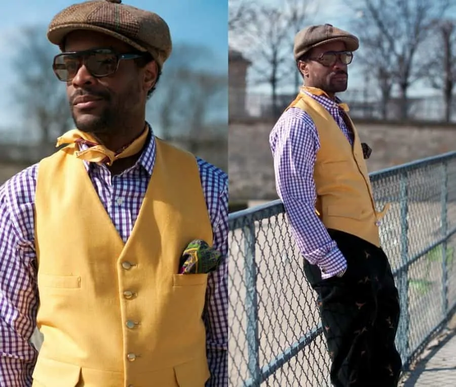 Karl-Edwin Guerre in Purple Checked Shirt with Yellow Doeskin vVest, Silk Paisley Neckkerchief & Tweed Hat by Vanesse Jackman