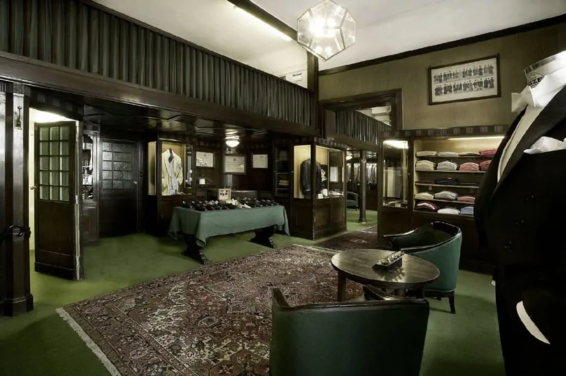 Dark Wood, Green Carpet & Persian Rug Creating the Look of a Belle Epoque Tailor Shop in London