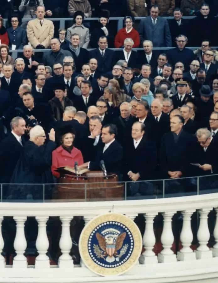 Chief Justice Earl Warren administering the oath of office to Richard M. Nixon on the east portico of the U.S. Capitol, January 20, 1969