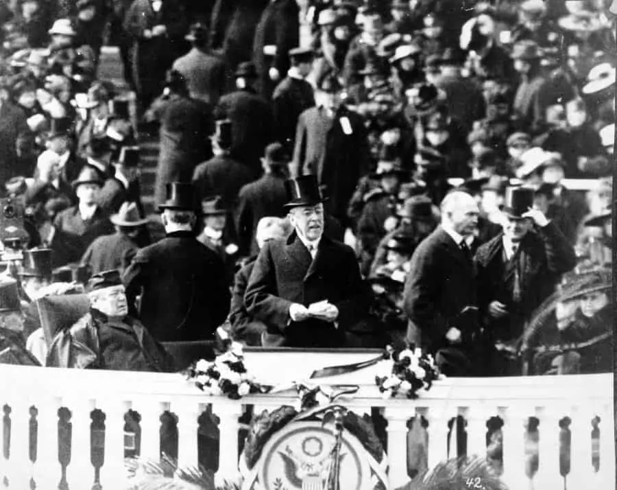 President Wilson, with top hat and speech in hand, delivering his inaugural address, March 5, 1917