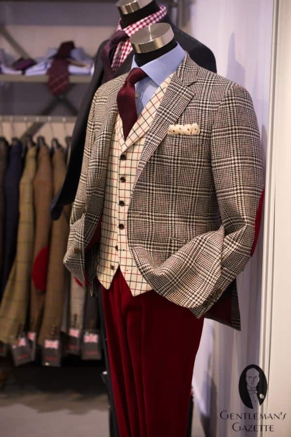 This patterned waistcoat by Chester by Chester Barrie pulls coordinates all the colors in this bold ensemble.