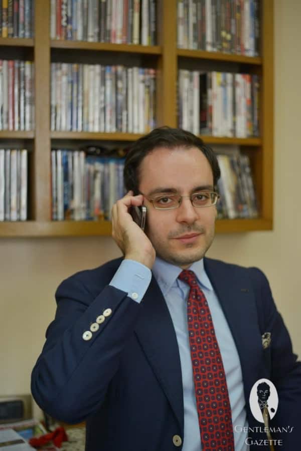 Gabriele in navy blazer with mother of pearl buttons