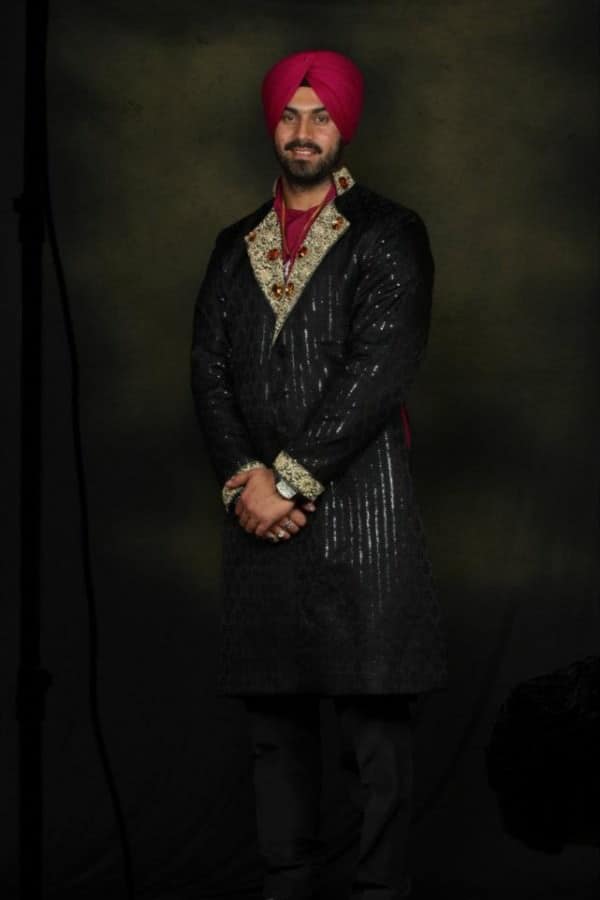 Heavily Embroidered And Decorated Achkan Embroidered and decorated Achkan