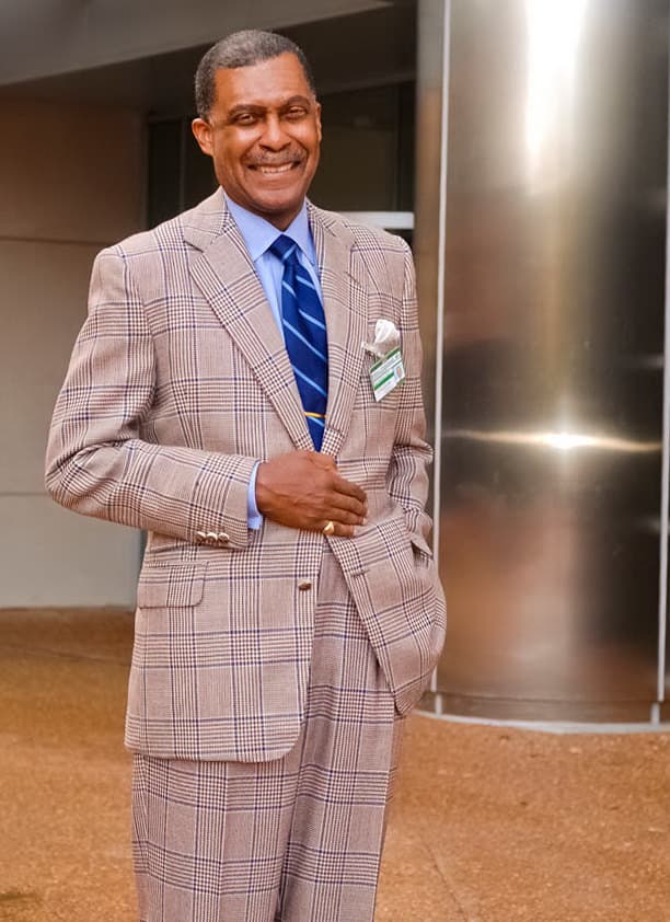 Dr. Andre Churchwell in beautiful plaid suit