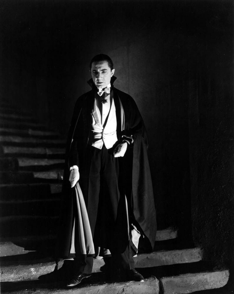 Bela Lugosi as Dracula in white tie with neckband order and evening cape 1931