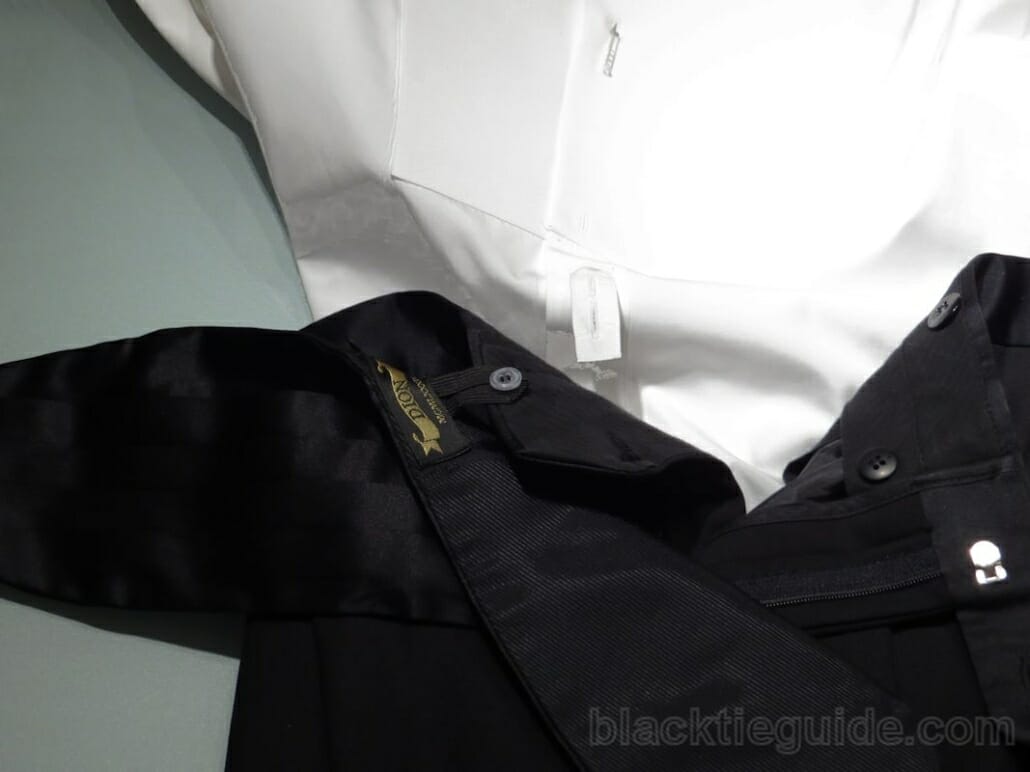 Waistband tab on the shirt that buttons into the pants so it won't come undone