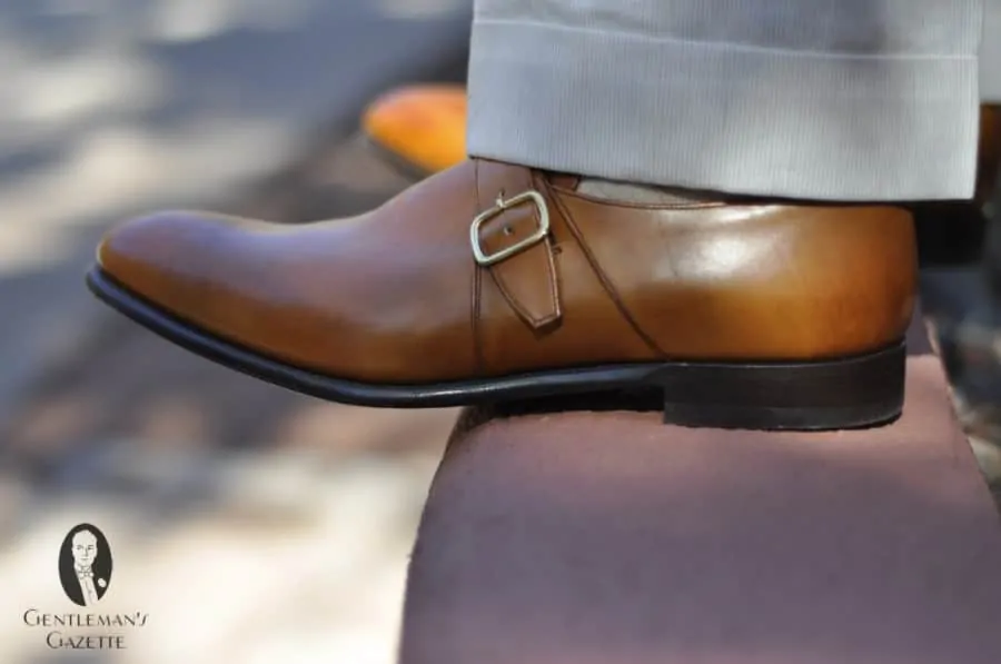 Tan Monk Strap Shoes with beige cuffed pants