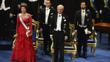 At the Nobel Prize Ceremony: Queen Silvia, Prince Daniel , King Carl Gustaf XVI and Prince Carl Philip of Sweden all wearing white tie with orders