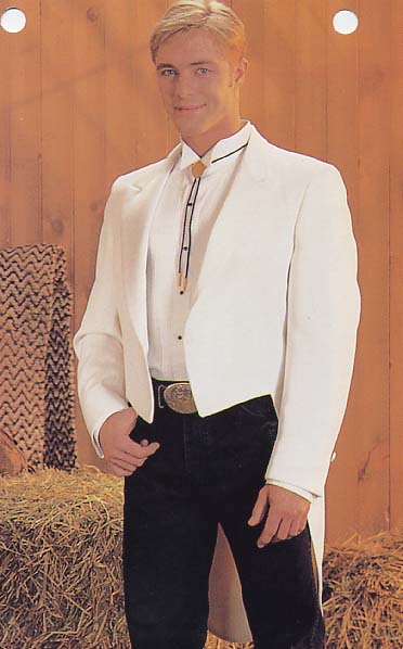 White spencer jacket with black pants, huge belt buckle and unusual shirt