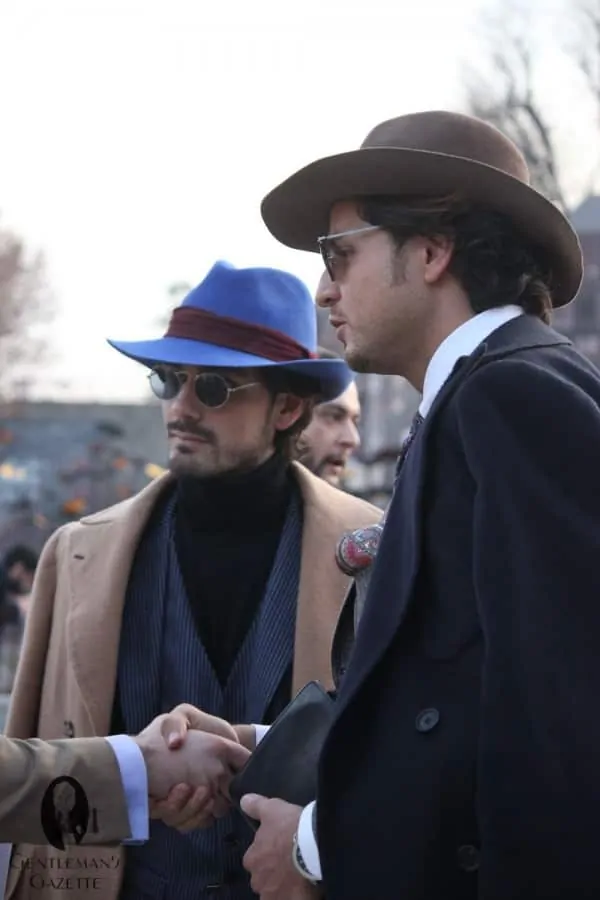 Gentlemen wearing hats outdoors