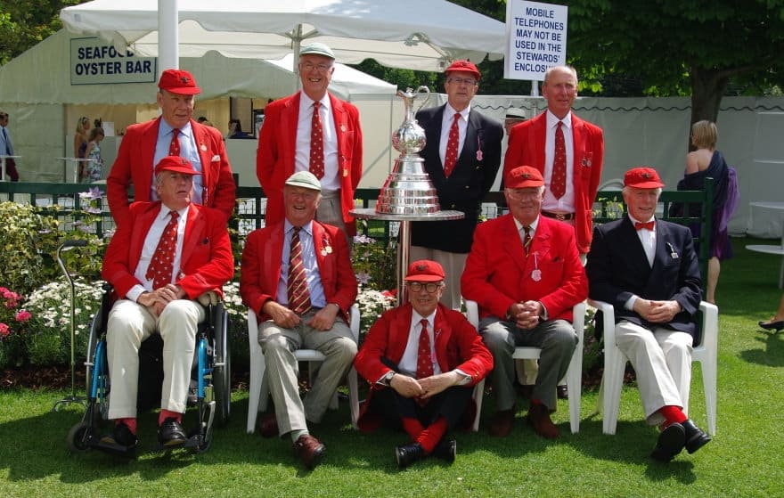 Scarlett red blazers of members of the Lady Margaret Hall Boat Club