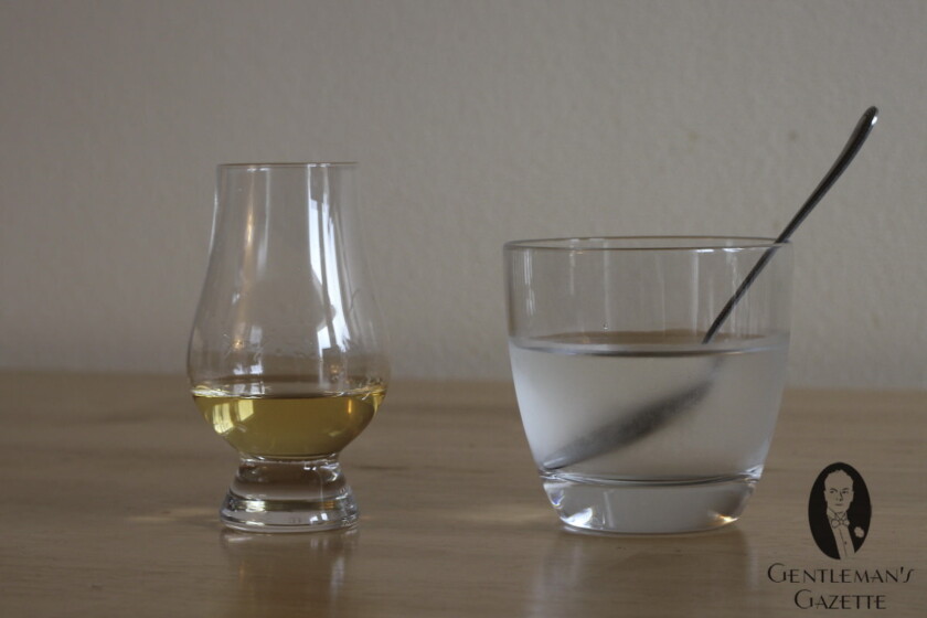 Whisky Glass, Teaspoon and chilled water