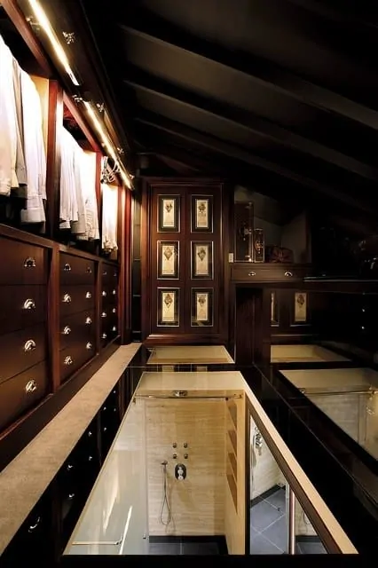 Closet under the roof with glass floor