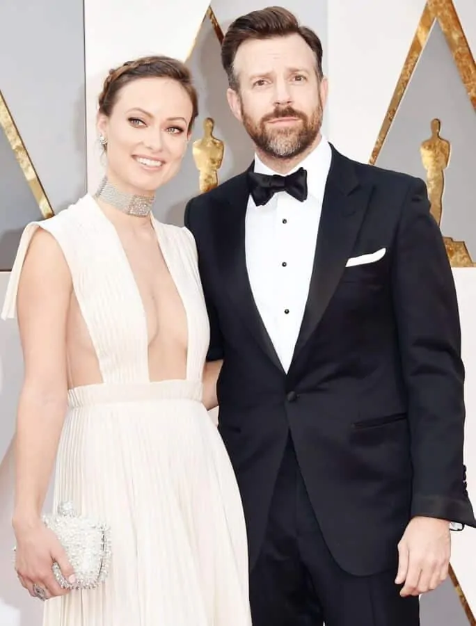 Olivia Wilde and Jason Sudeikis with turndown collar, self tie bow tie, black studs and cuffs - sleeves too long