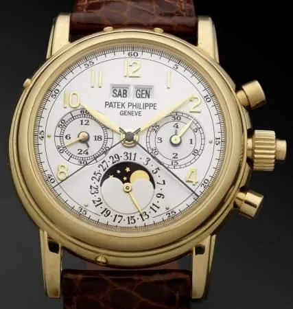 Patek Philippe. A very fine and rare 18ct gold manual wind perpetual calendar split seconds chronograph wristwatch with moon phases