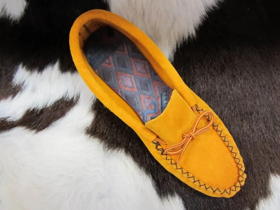 U-shaped uppers on a soft sole moccasin