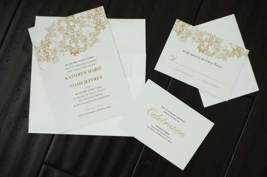 A wedding invitation with an invitation to the reception and a response card