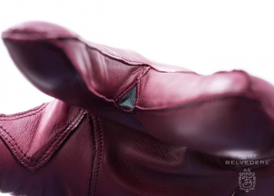 Close Up Of Burgundy Mens Dress Gloves Quirks Close up of Burgundy Men's Dress Gloves Quirks