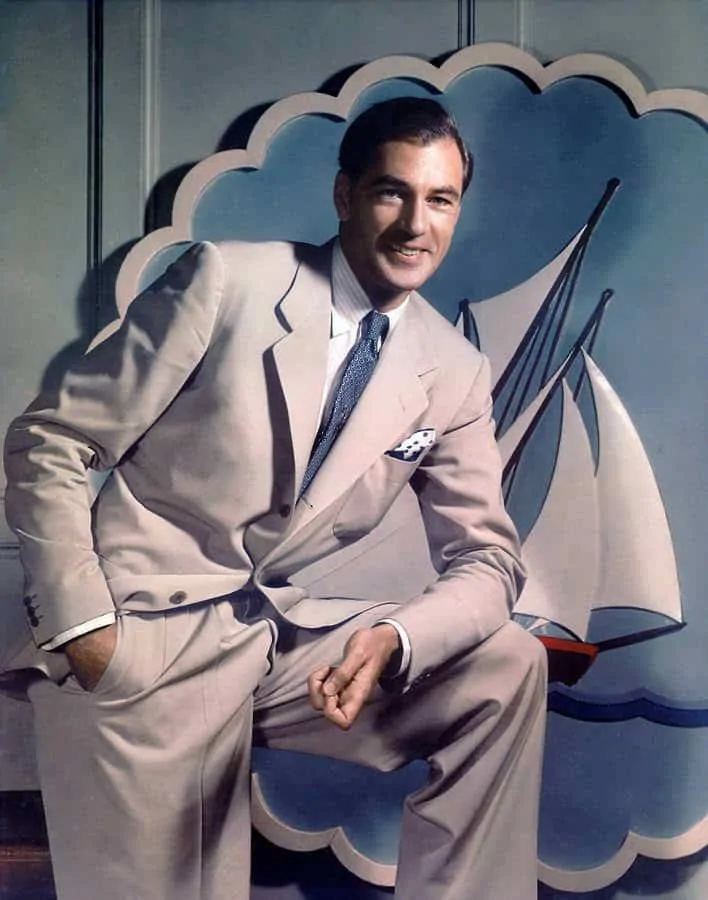 Gary Cooper, Late 1930s wearing a light grey suit with blue printed tie