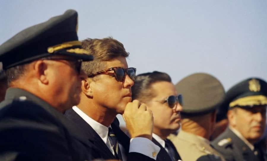 JFK wearing gold cufflinks and tortoiseshell sunglasses