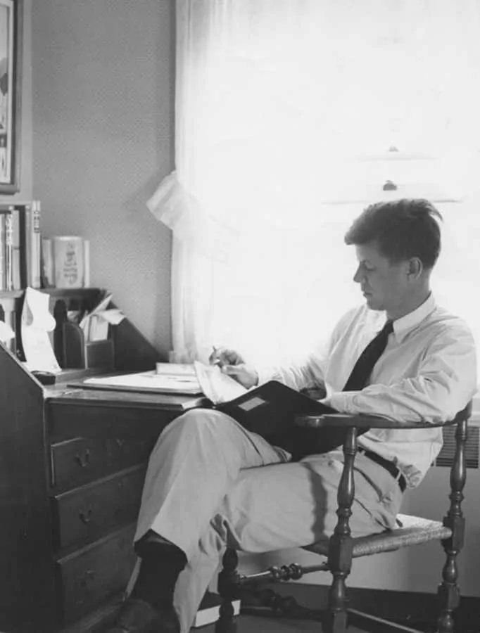 JFK with shirt tucked in