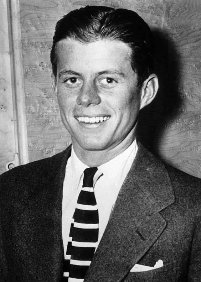 Young John F. Kennedy in a tweed jacket and stripe tie