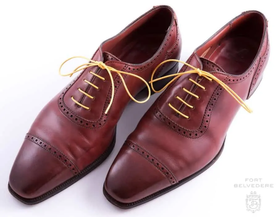 Yellow Shoelaces Round Waxed Cotton - Made in Italy by Fort Belvedere in an oxblood oxfords