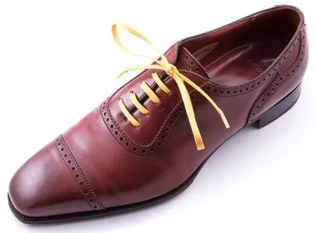Yellow Shoelaces on Brown Oxford