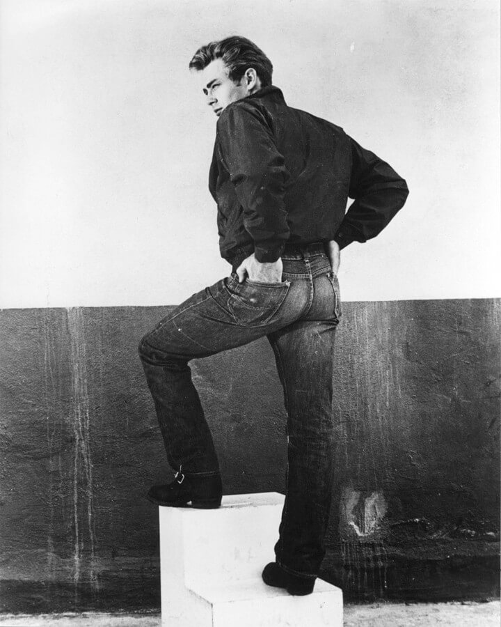 James Dean shows off the fit of his blue jeans in Rebel Without a Cause.