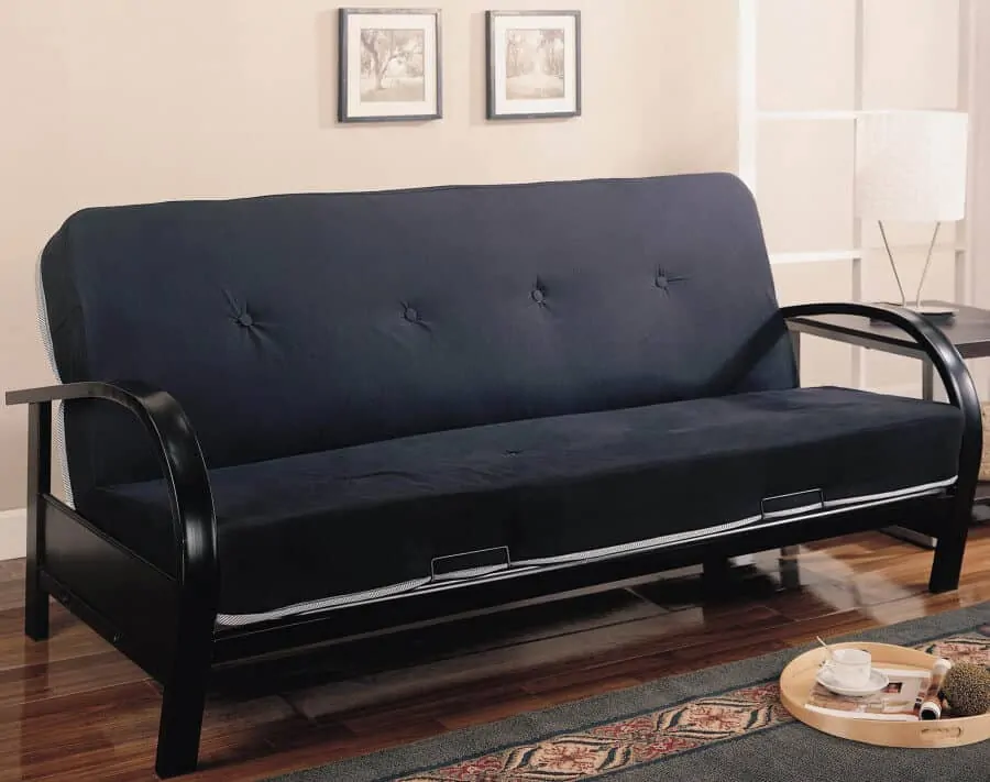 Futons are rarely attractive but they can be useful when appropriately placed