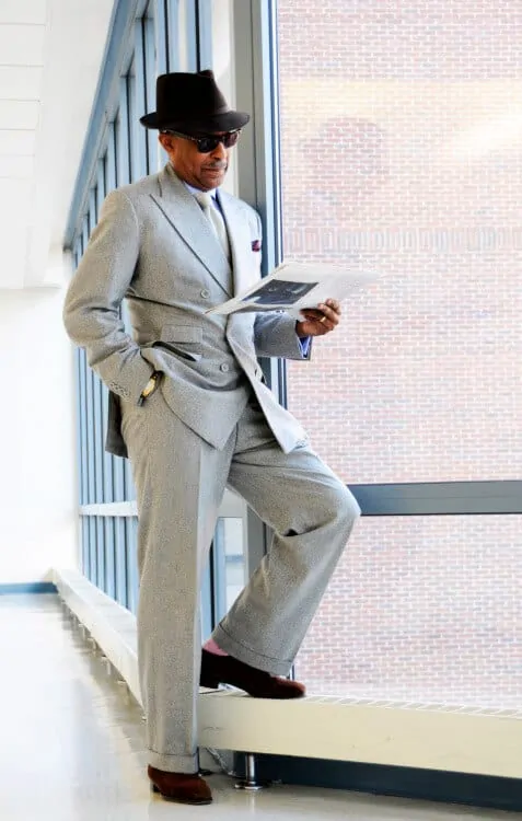 Dr. Churchwell in light gray flannel suit