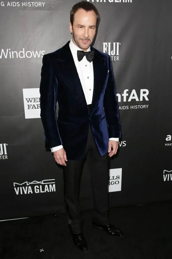 Tom Ford wearing a velvet smoking jacket