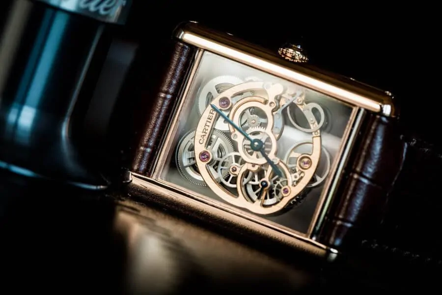 A Cartier Tank skeleton watch can add some sprezzatura to your tuxedo