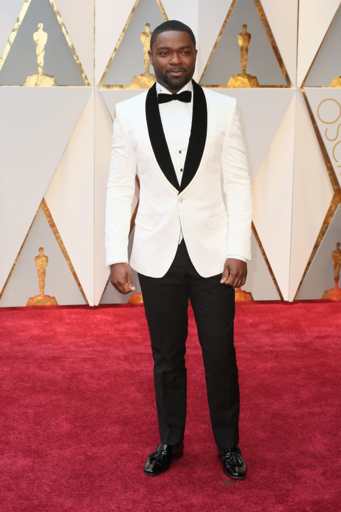 David Oyelowo wearing Dolce & Gabbana outfit - note the unusual placement of the shirt studs and patent leather tassel loafers
