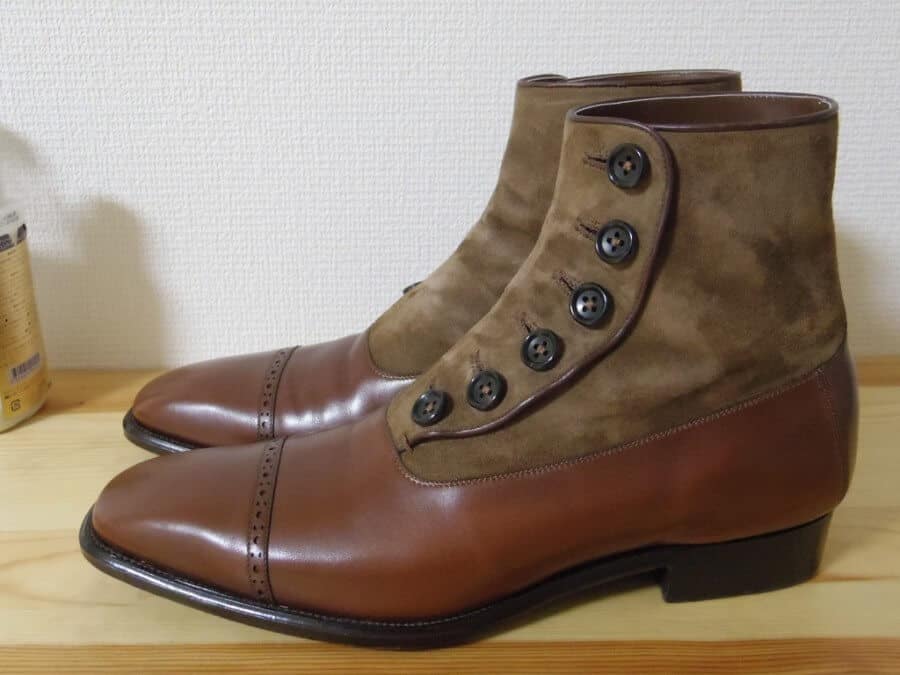 black boots with buttons on the side