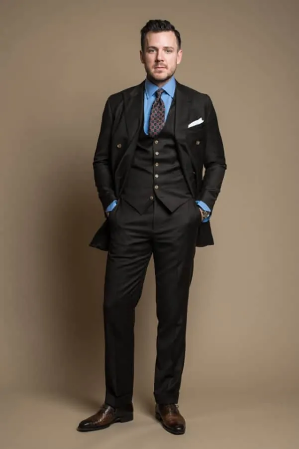Dan Trapanier - Brown business suit